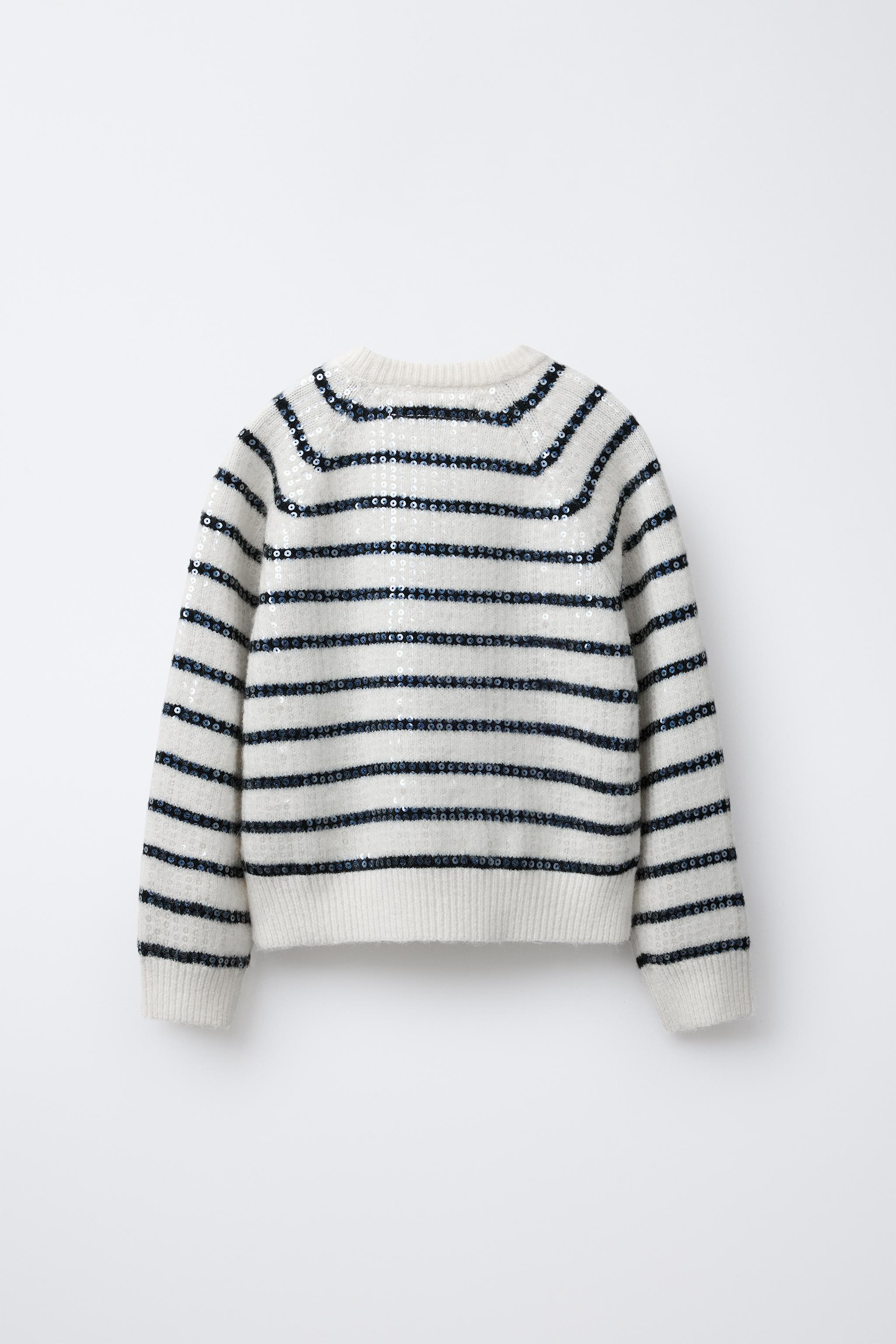 PULL EN MAILLE À RAYURES ET PAILLETTES